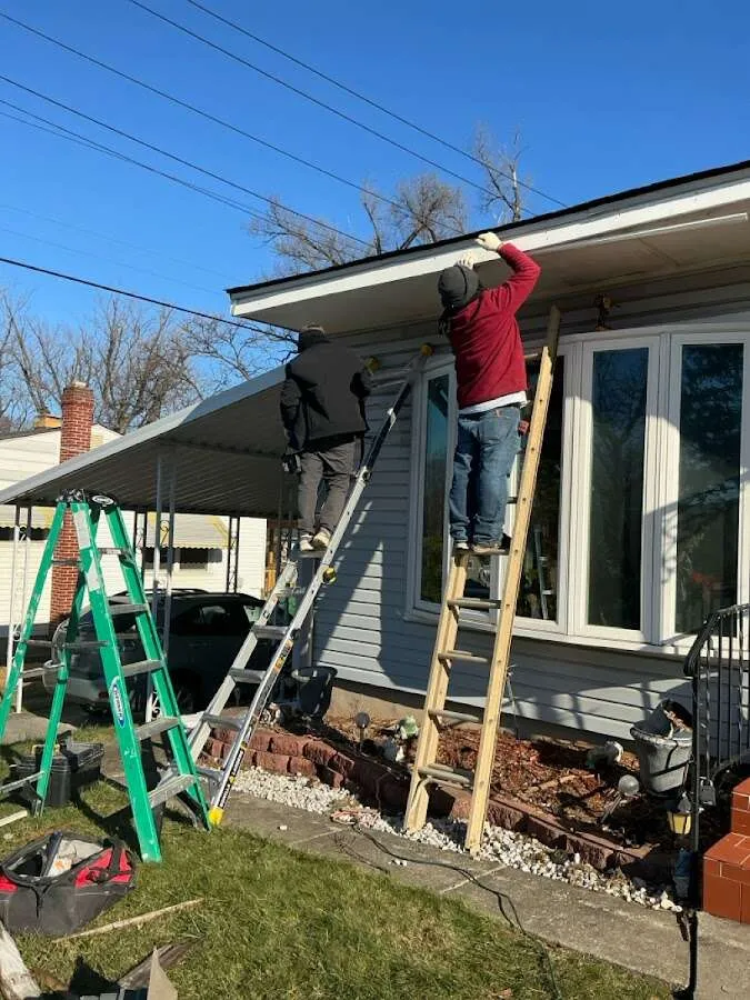 Restoration crew performing exterior repair in Mendota