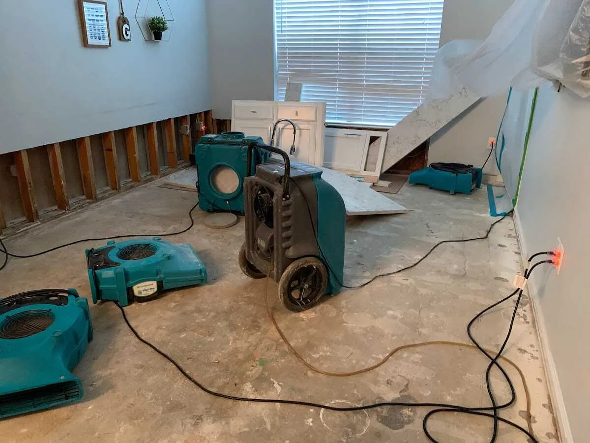 Dehumidifier in flood-cut room for Water Damage Restoration in Mendota